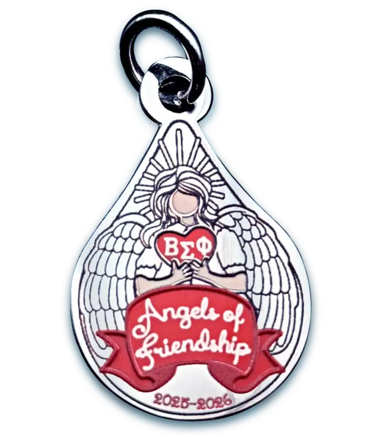 Enamal commemorative charm of an angel holding a heart