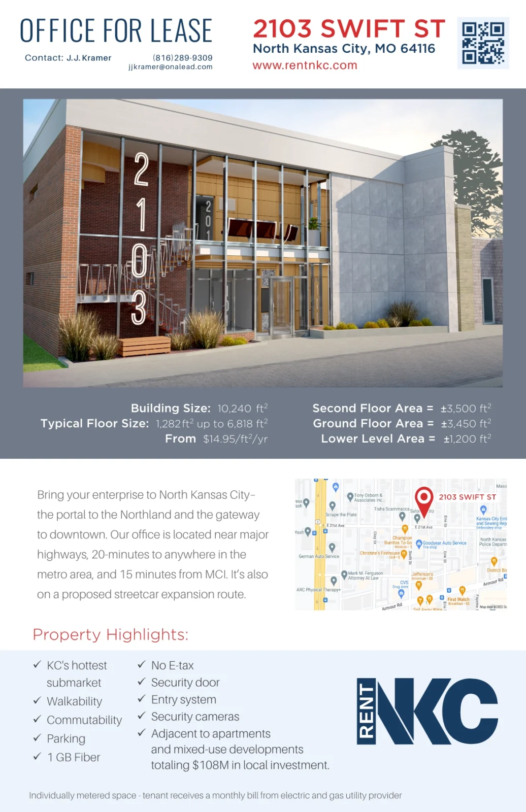 Modern office building with glass facade and brick accents, for lease in North Kansas City.