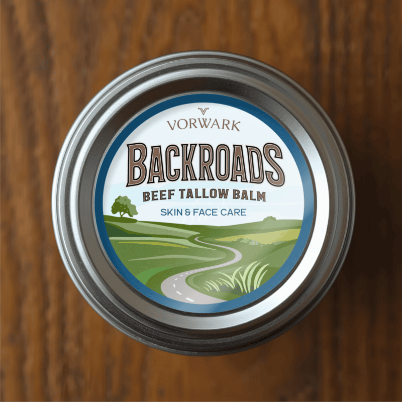 Natural beef tallow balm for skin and face care, in a round tin container.