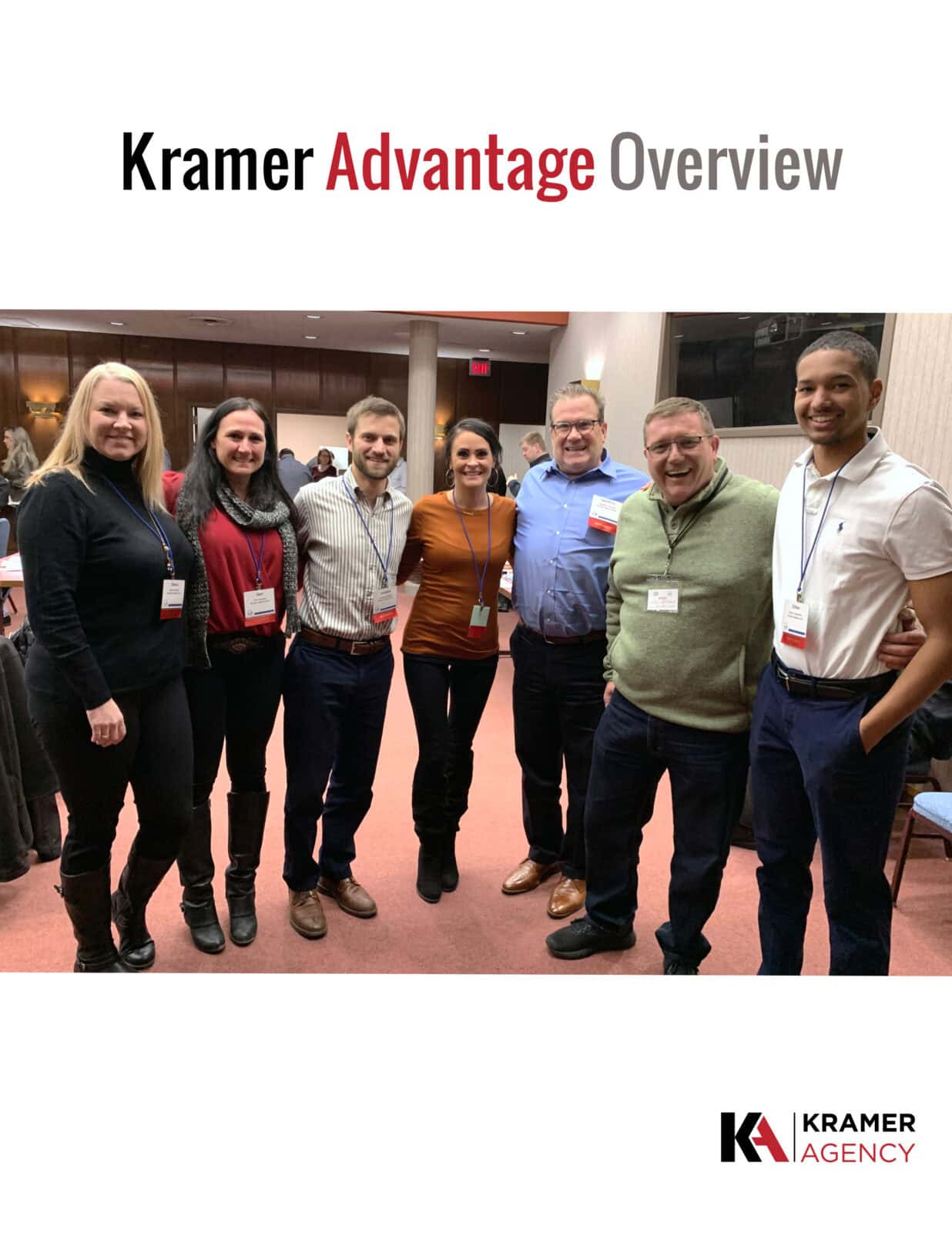 A diverse group of professionals smiling at a corporate networking event.