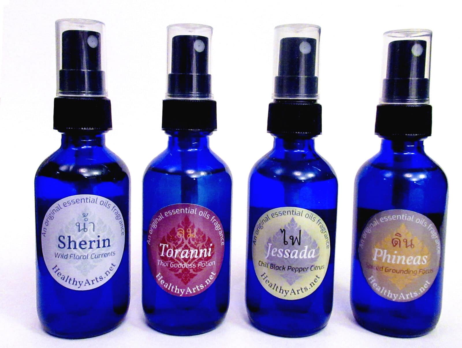 Vibrant blue essential oil bottles with colorful labels showcasing branding and packaging design.