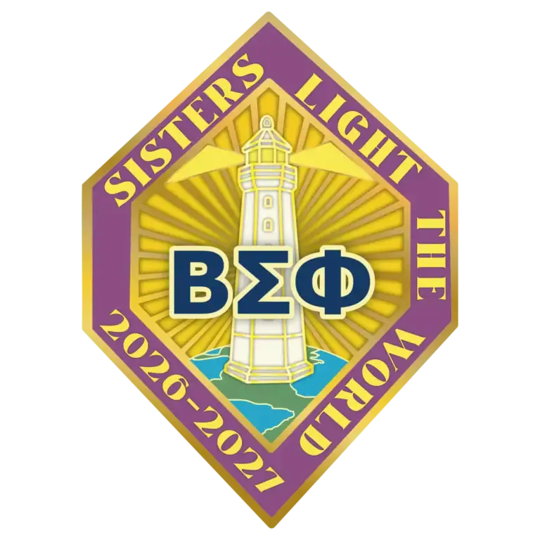 Bright emblem featuring a lighthouse with radiant beams, Greek letters, and a purple and gold border.