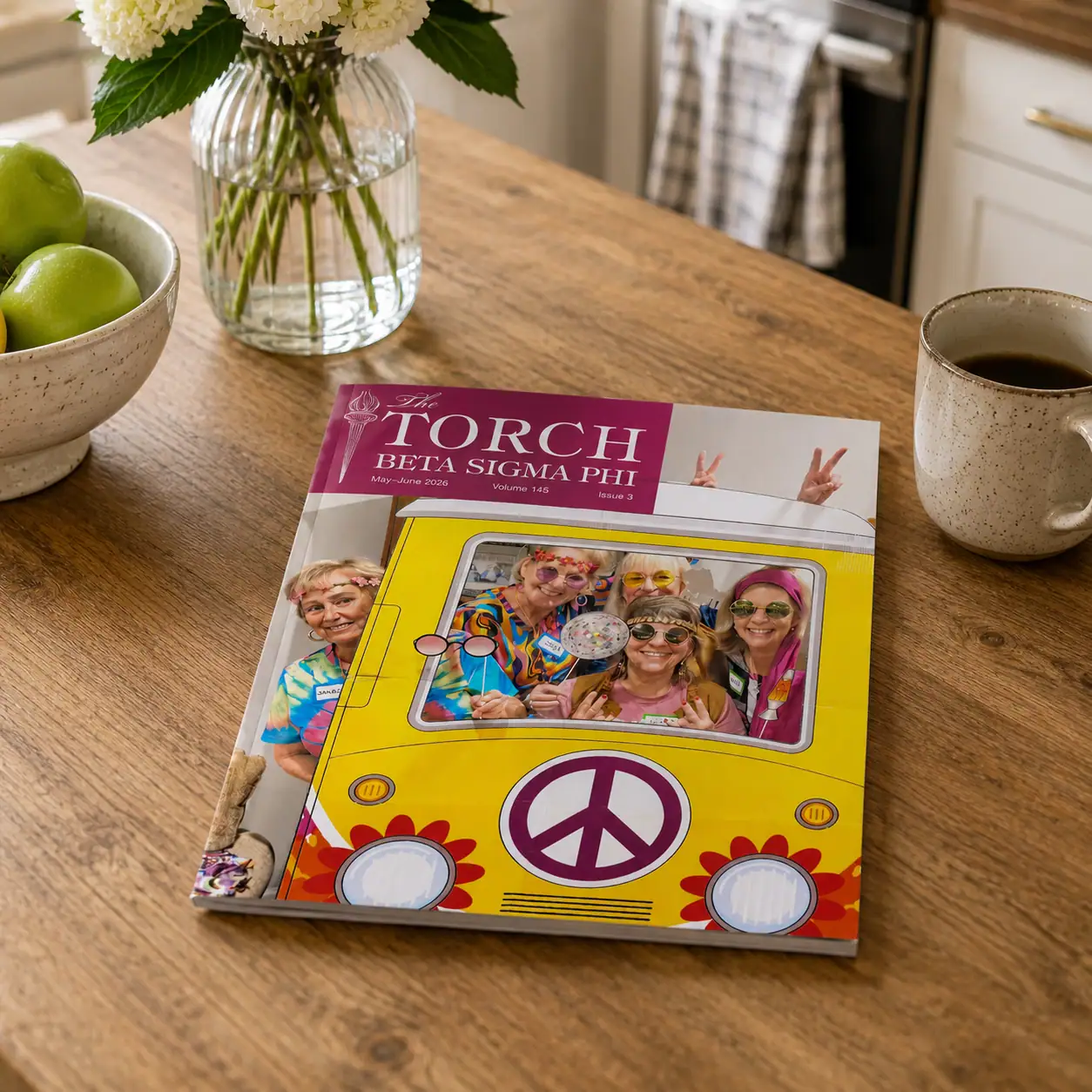 TORCH magazine cover with colorful retro bus design and group of cheerful women.